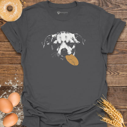 Charcoal t-shirt featuring a white graphic of a dog holding a brown cookie in its mouth.