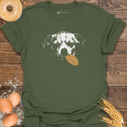 Military Green t-shirt featuring a white graphic of a dog holding a brown cookie in its mouth.